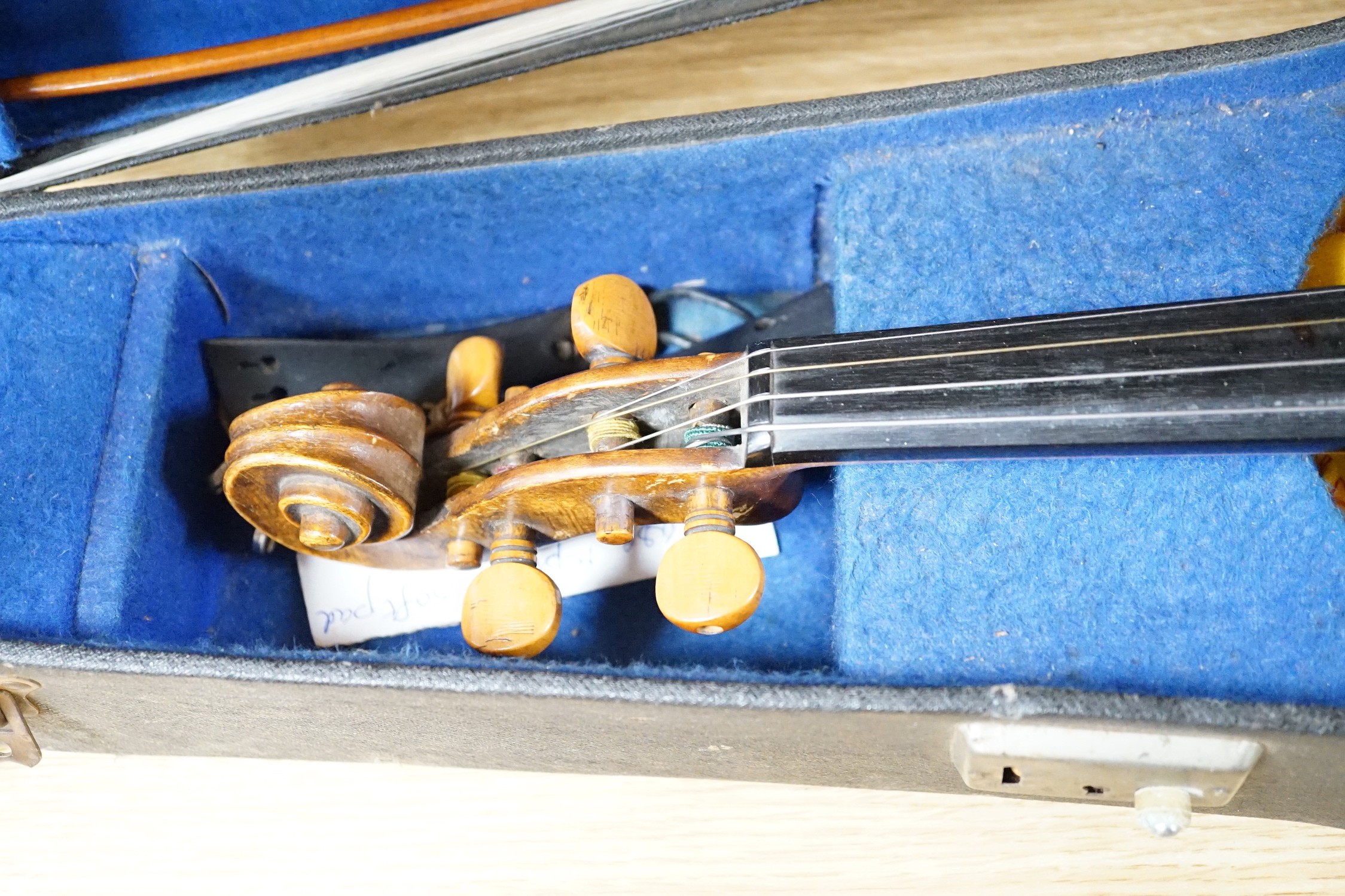 15 1/4 inch viola, cased, circa 1880 and a silver mounted bow with ivory tip, viola 65 cms long
